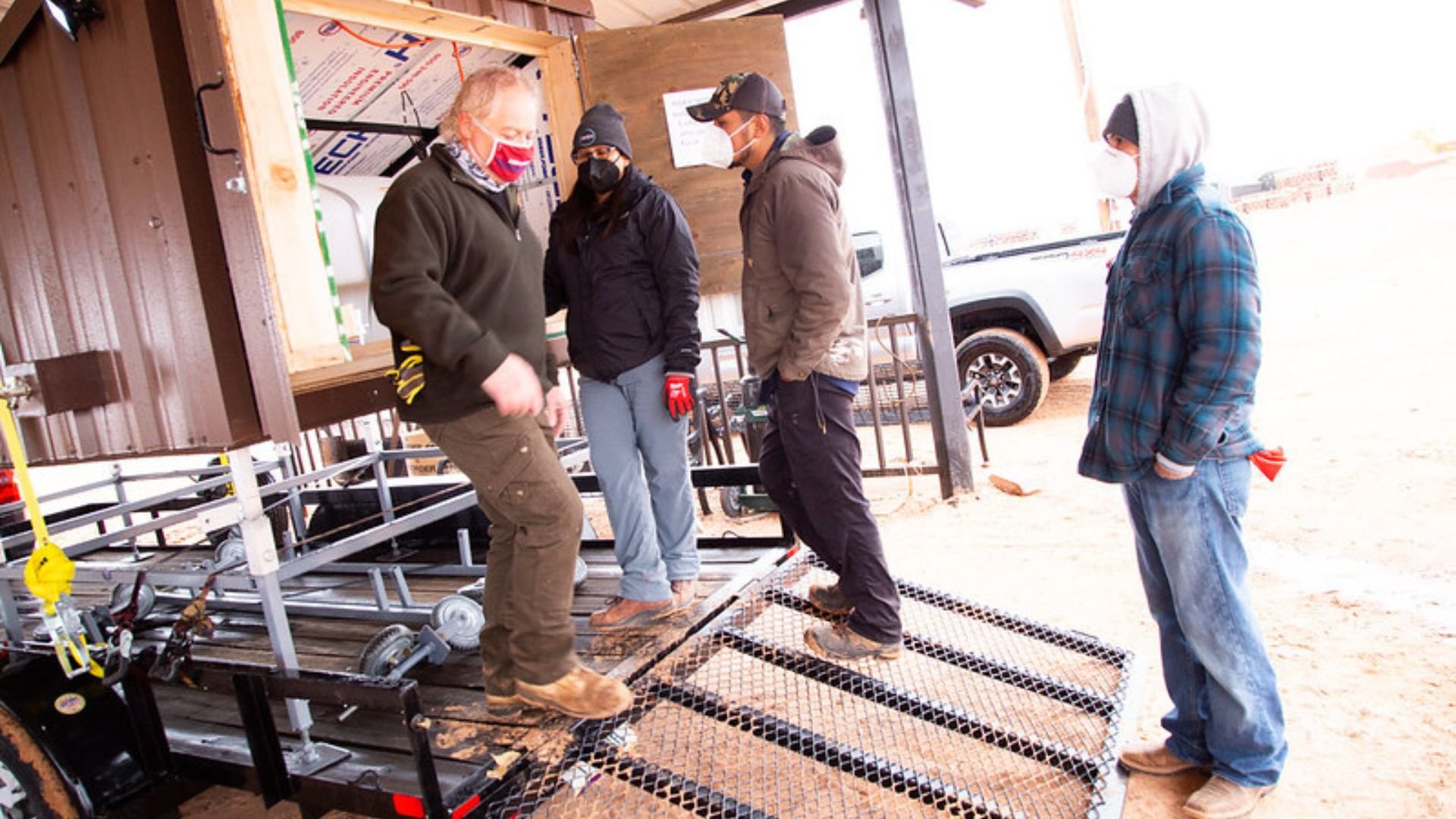 IWSH plumbers unloading Navajo wash stations